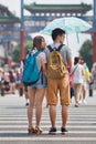 Young lovers with a parasol, Beijing, China